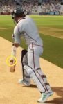 BALL VISIBLE FROM BEHIND AFTER TOUCHING THE BAT.jpg