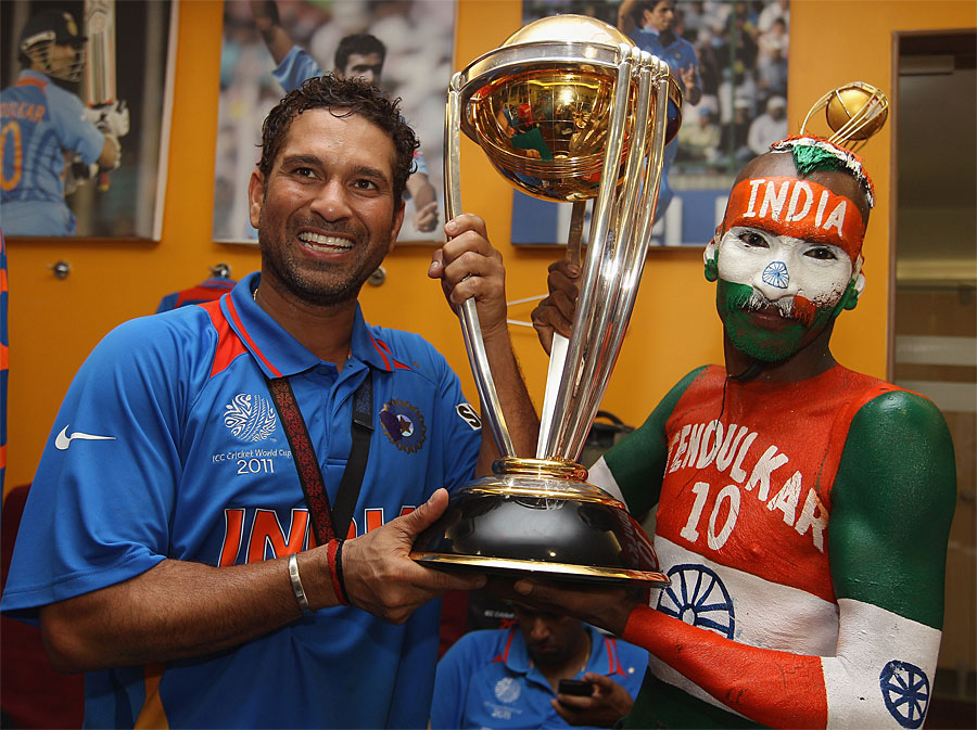 Sachin+Tendulkar+holds+aloft+the+World+Cup+with+one+of+his+long-time+fans%252C+Sudhir+Gautam%252C+April+2%252C+2011%25C2%25A9Getty+Images.jpg