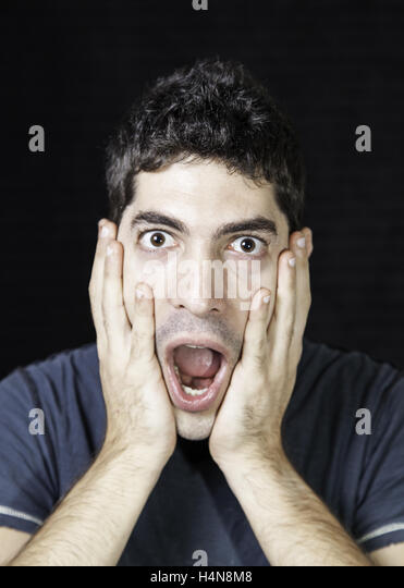 frightened-man-screaming-scared-and-surprised-young-h4n8m8.jpg